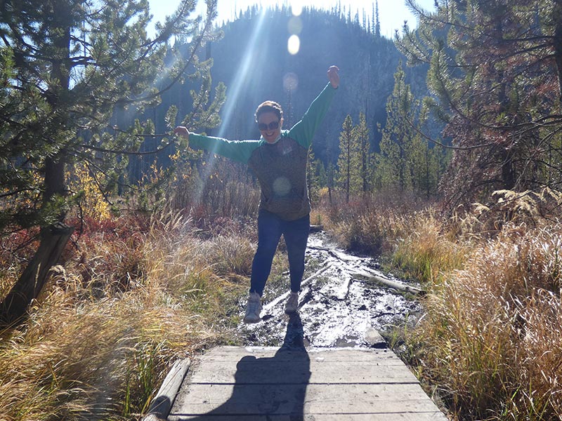 girl-enjoying-while-on-the-hike-of-the-fairy-falls-yellowstone