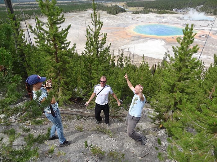 people-doing-photography-while-on-yellowstone-hike